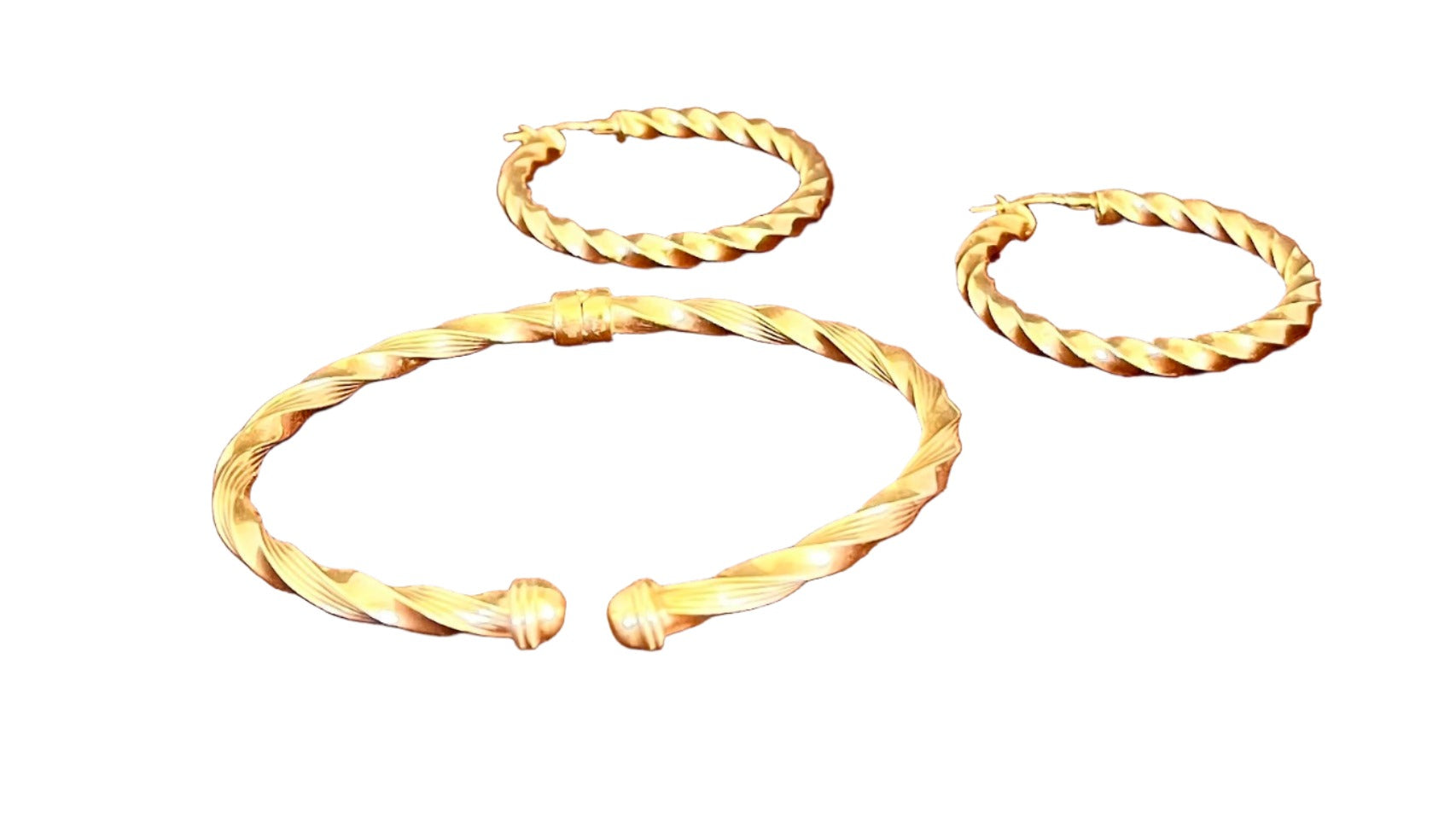 Twisted gold bangle