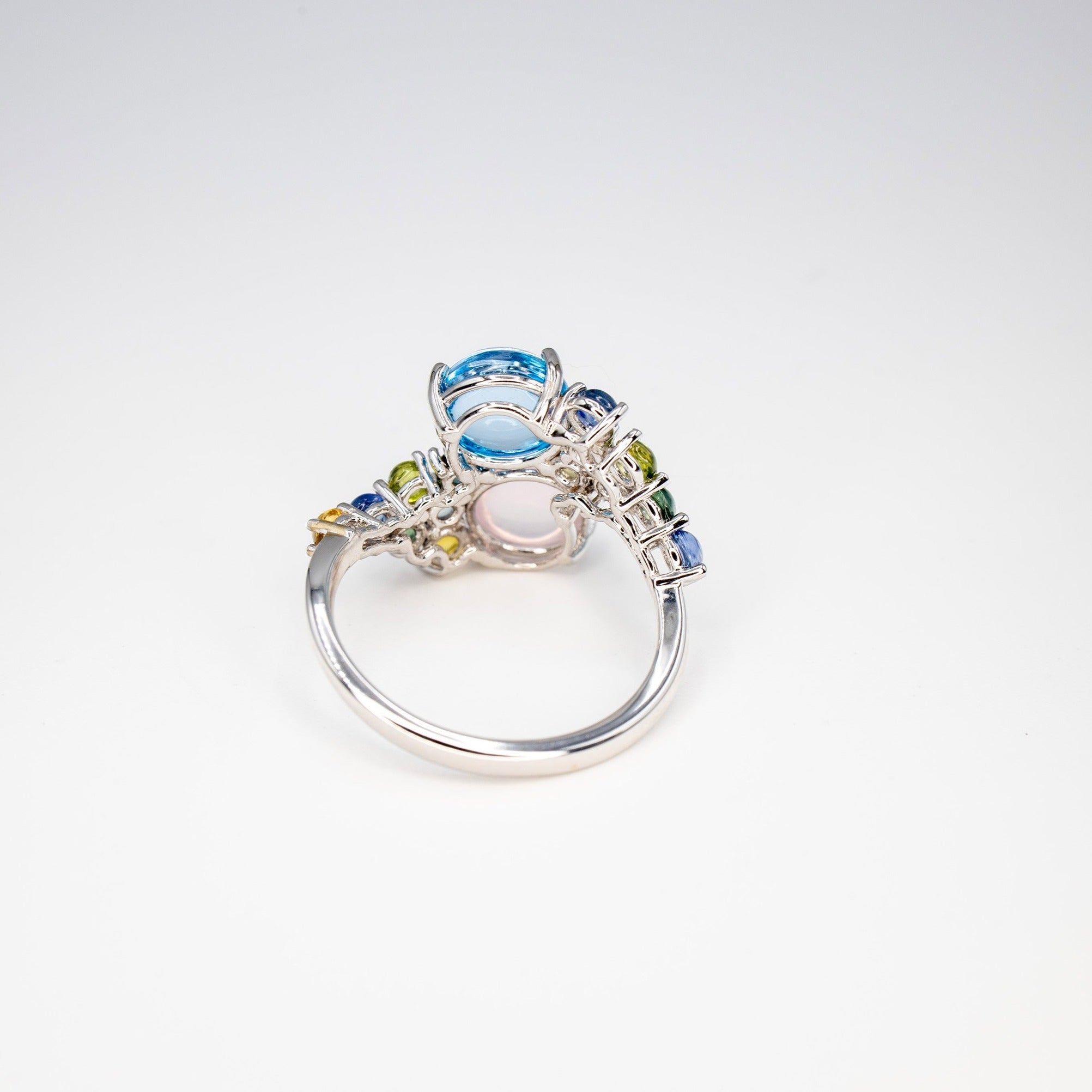 A cabochon bypass Ring Topaz Quartz Sapphire